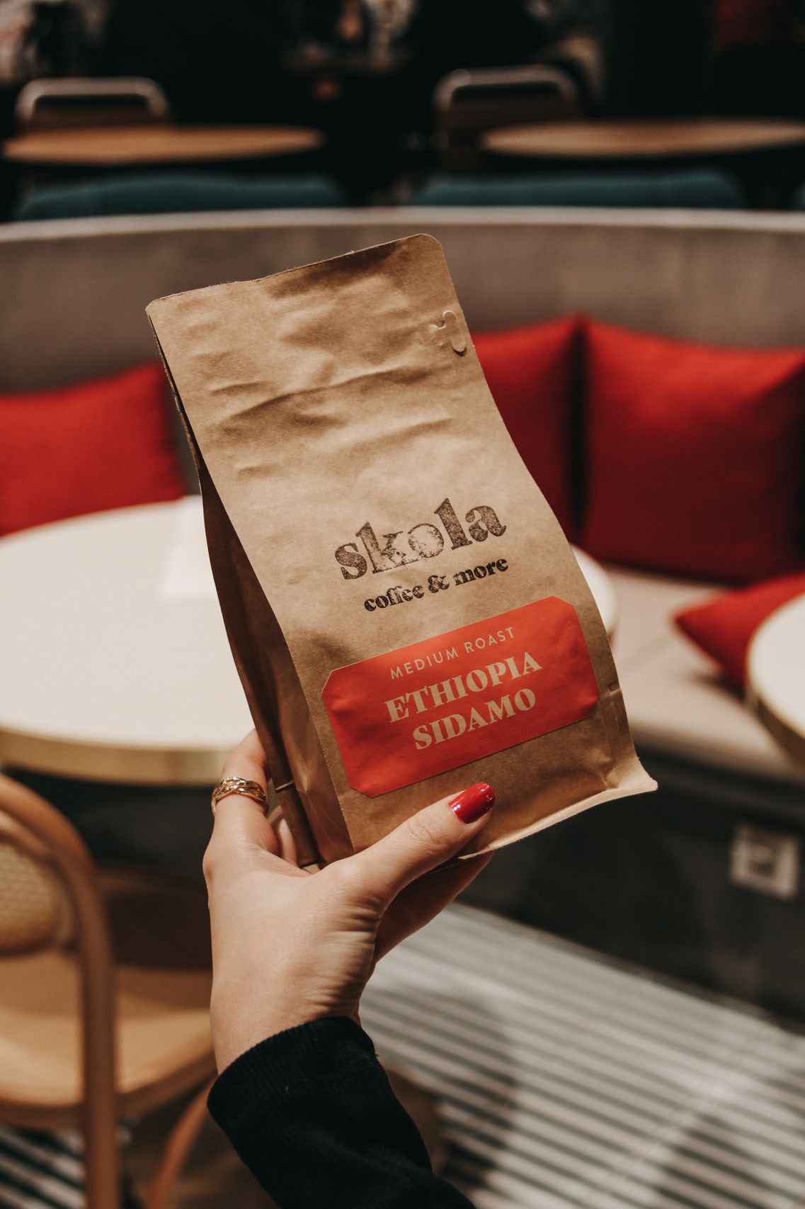 Dark green coffee bag labeled COLOMBIA SUPREMO