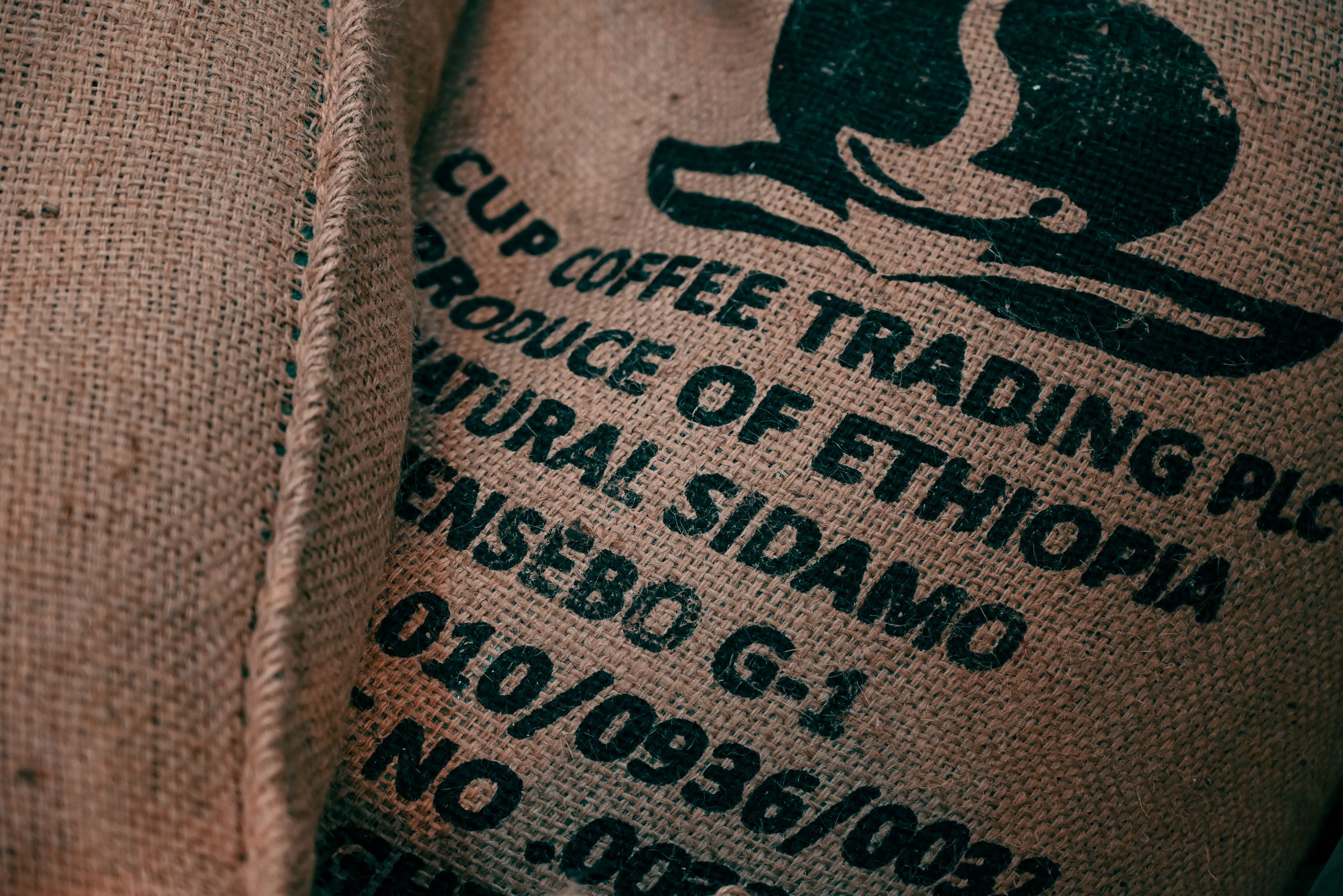 Ethiopia Sidamo coffee bag with mug and beans