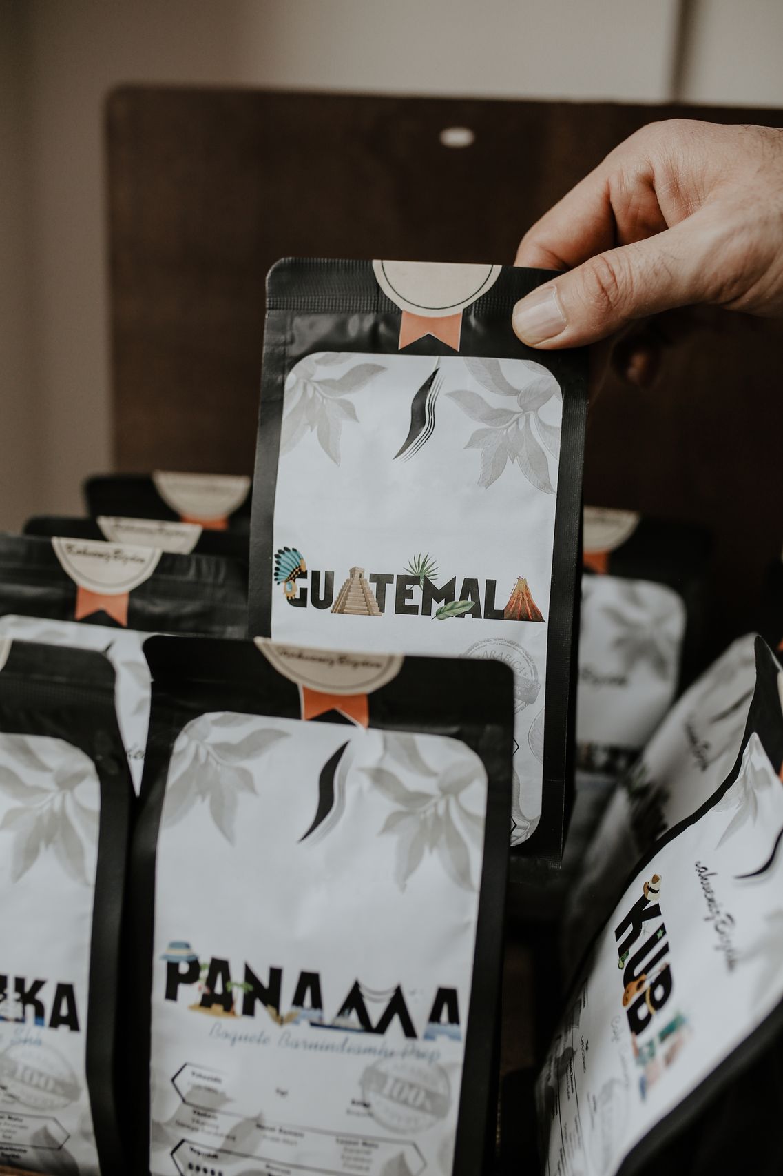 Black coffee bag labeled SINGLE-ORIGIN ESPRESSO